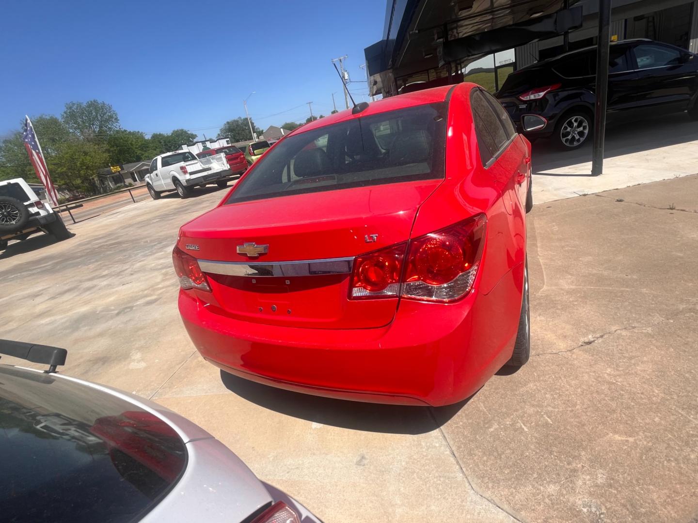 2016 RED CHEVROLET CRUZE LIMITED 2LT 2LT Manual (1G1PF5SB7G7) with an 1.4L L4 DOHC 16V TURBO engine, 6-Speed Manual transmission, located at 8101 E. Skelly Dr., Tulsa, OK, 74129, (918) 592-3593, 36.121891, -95.888802 - Photo#4